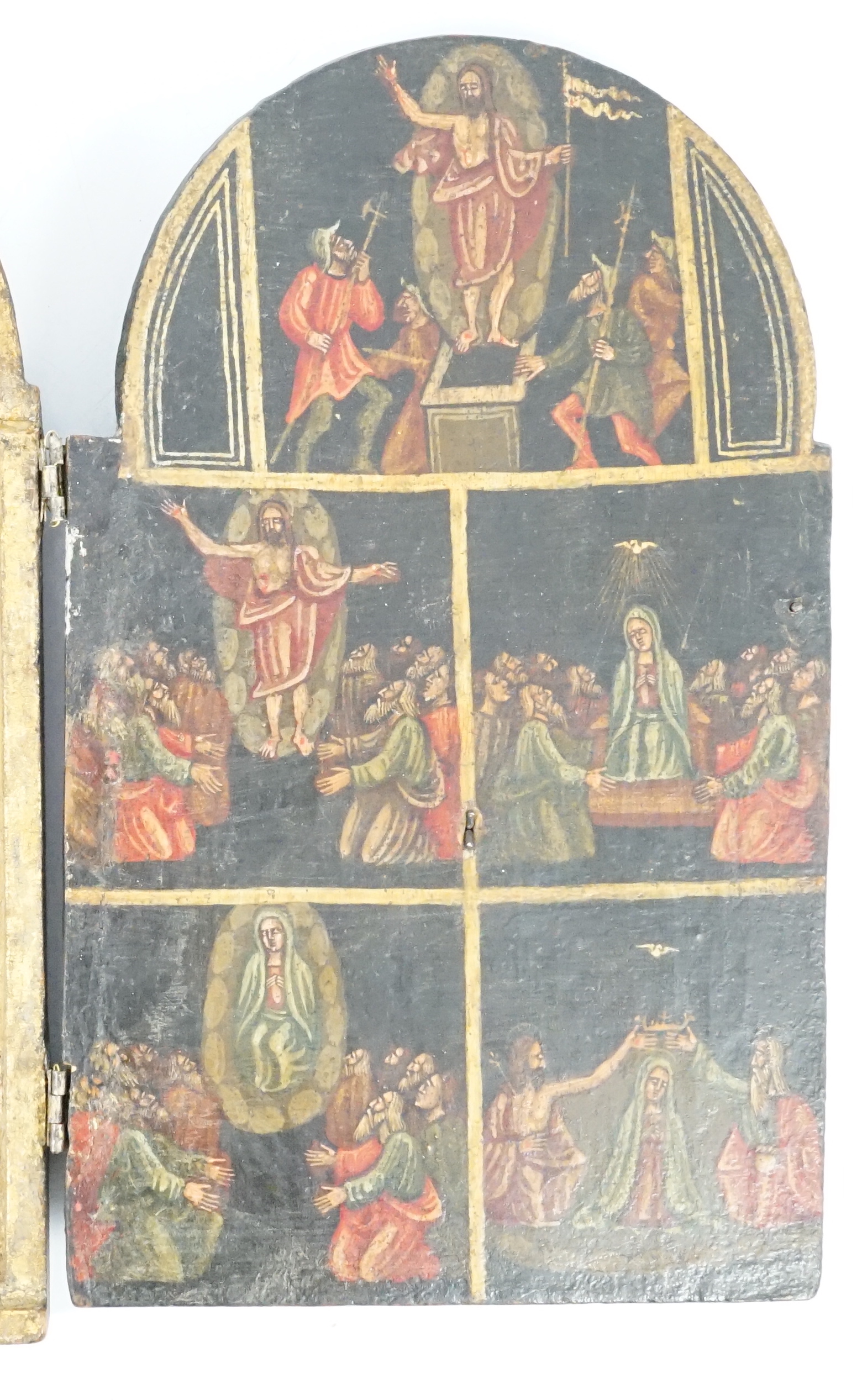 A 17th century triptych case, oil on wood, Icon depicting the life of Christ, with a Saint receiving stigmata on one of the two doors, 11.5cm wide, 18.75cm high, when opened out 33.5cm wide